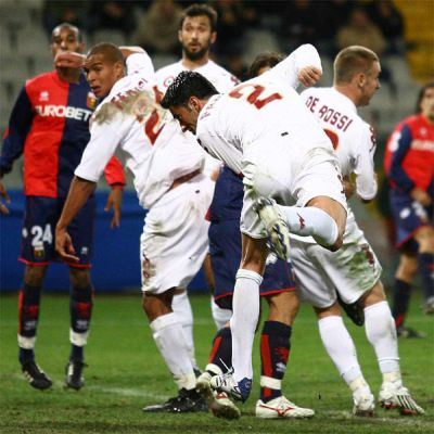Panucci scores while De Rossi blocks Borriello