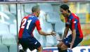 both Marco’s celebrate their goals against Cagliari