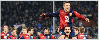 goalscorer Rafinha on the shoulders of Eduardo after the derby